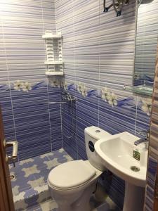 Een badkamer bij Dilbo House