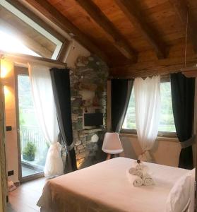 Postel nebo postele na pokoji v ubytování B&B Lo Matsòn