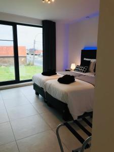 Postel nebo postele na pokoji v ubytování Vita Roka met extra Luxe Privé Wellness