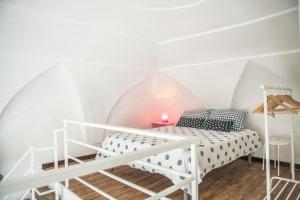 a bedroom with a bunk bed and a bedside table at Belmar in Gaeta