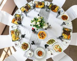 an overhead view of a table full of food at Oasis Hotel in Gaborone