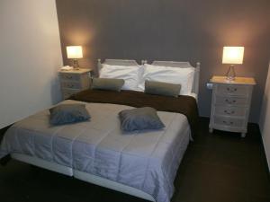 Voodi või voodid majutusasutuse Hotel Ristorante Borgo Antico toas