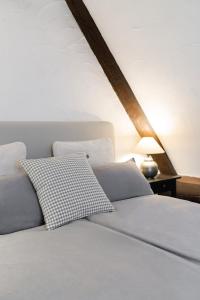 Postel nebo postele na pokoji v ubytování Moderne trifft auf Fachwerk