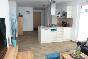Η κουζίνα ή μικρή κουζίνα στο Ferienwohnung Störtebekersuite +14 φωτογραφίες