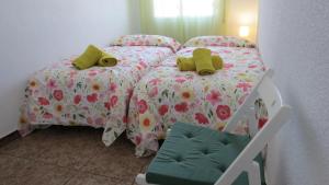 Ліжко або ліжка в номері Patios de San Pedro