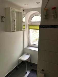 Koupelna v ubytování Schöne Ferienwohnung DG + 23 fotografií