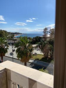 a view of the ocean from a balcony at Hotel Lungomare in Reggio di Calabria