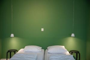 מיטה או מיטות בחדר ב-Appartementen Zeerust