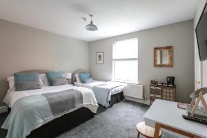 Postel nebo postele na pokoji v ubytování Baytree Lodge Chester