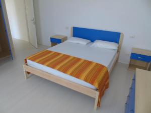 
Postel nebo postele na pokoji v ubytování Condominio Nautilus

