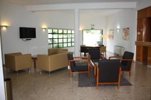 TV a/nebo společenská místnost v ubytování Flag Hotel Santarém