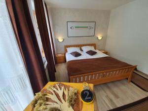 Postel nebo postele na pokoji v ubytování Restaurant and rooms Kotlar