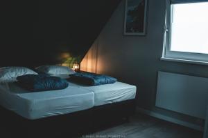 Gulta vai gultas numurā naktsmītnē Huisje aan Zee
