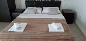 Кровать или кровати в номере Affabilis VIP House