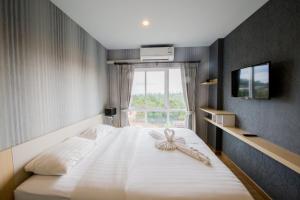 Postel nebo postele na pokoji v ubytování Aonang Ocean View Studio ( The Sea Condo ) + 24 fotografií