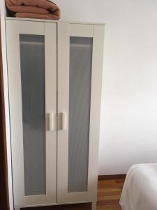 Posteľ alebo postele v izbe v ubytovaní Apartamento Vacacional do Pexigo