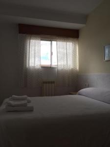 Posteľ alebo postele v izbe v ubytovaní Apartamento Vacacional do Pexigo