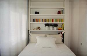 A bed or beds in a room at Riva Celeste
