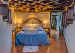 Katil atau katil-katil dalam bilik di Villa Valdroni