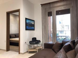 Posezení v ubytování Nice Wellness Apartman