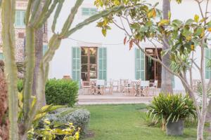 Ogród w obiekcie Curolla Petit Hotel