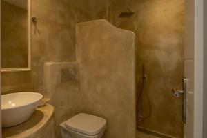 Koupelna v ubytování Caldera Romantica Hotel