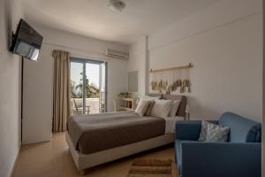 Postel nebo postele na pokoji v ubytování Caldera Romantica Hotel