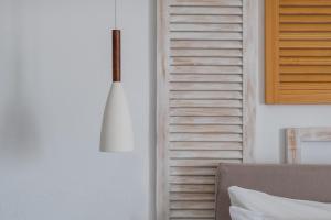 Postel nebo postele na pokoji v ubytování Caldera Romantica Hotel