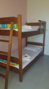 a couple of bunk beds in a room at Athina Apartments Tolo in Tolo