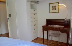 A bed or beds in a room at Riva Celeste