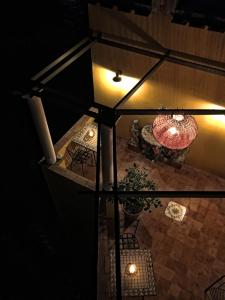 an overhead view of a patio at night with lights at La Terrazza sul Mare in Capri