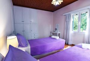 Posteľ alebo postele v izbe v ubytovaní Karmela's Cottage by CorfuEscapes