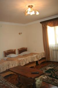 Postel nebo postele na pokoji v ubytování Hotel Noy