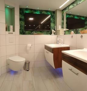 Kylpyhuone majoituspaikassa Ferienwohnung Baer