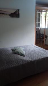Postel nebo postele na pokoji v ubytování villa Philexiane + 12 fotografií