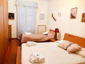 Postel nebo postele na pokoji v ubytování Casa Vacanza I principini + 15 fotografií