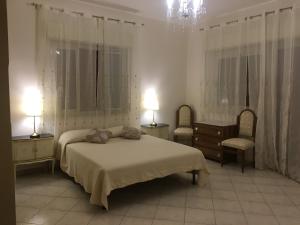 Cama ou camas em um quarto em La Terrazza