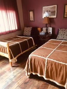 Postel nebo postele na pokoji v ubytování A Hyde Away Inn B&B