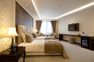 Katil atau katil-katil dalam bilik di Black Bird Thermal Hotel & SPA