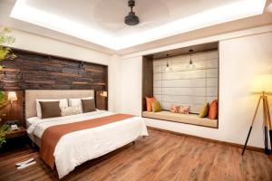 Virohaa Hotel tesisinde bir odada yatak veya yataklar