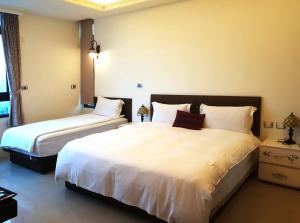 Letto o letti in una camera di Water Ripple