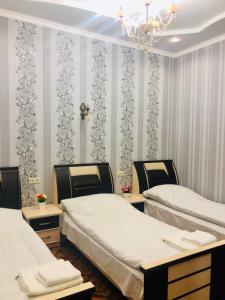 Postel nebo postele na pokoji v ubytování Har-Mar Hotel + 18 fotografií