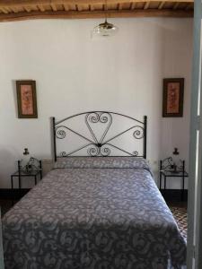 Posteľ alebo postele v izbe v ubytovaní La Casa de Monica