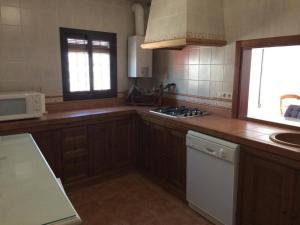 Kuchyňa alebo kuchynka v ubytovaní La Casa de Monica + 12 fotografií