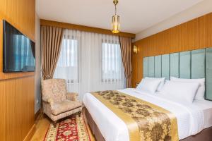Кровать или кровати в номере Acra Hotel - Special Category