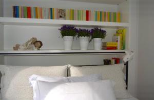 A bed or beds in a room at Riva Celeste