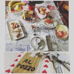 una mesa con un plato de comida en la parte superior en Al Pozzo, en Negrar