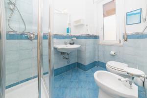 Koupelna v ubytování Hotel De Rosa