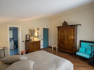 Postel nebo postele na pokoji v ubytování La Via Francigena B&B