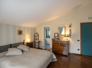 Postel nebo postele na pokoji v ubytování La Via Francigena B&B